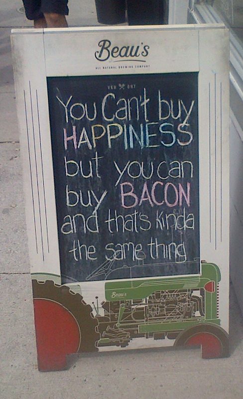 Sign outside 'Dirty Food' restaurant on Dundas Street West in Toronto